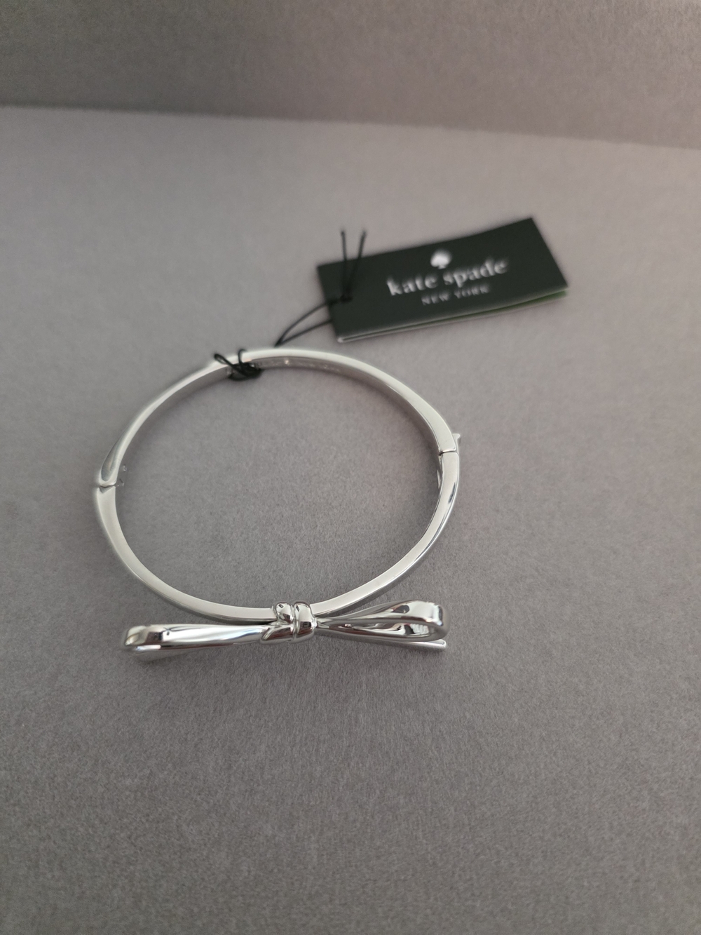 kate spade silver-tone bow bangle bracelet